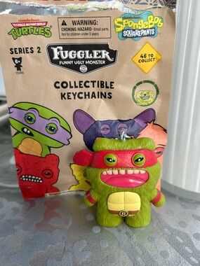 Fuggler x Teenage Mutant Ninja Turtles Series 2 Raphael collectible keychain.